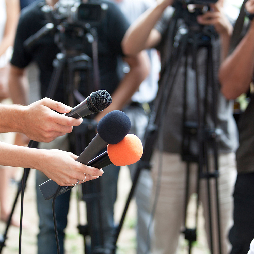 How to work with journalists - microphones at interview